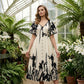 👗 50% RABATT NU! 🌿 Mjuk klänning i botaniskt mönster med V-ringning och medellång kjol – Elegant, lätt och mångsidig för alla tillfällen 🌸