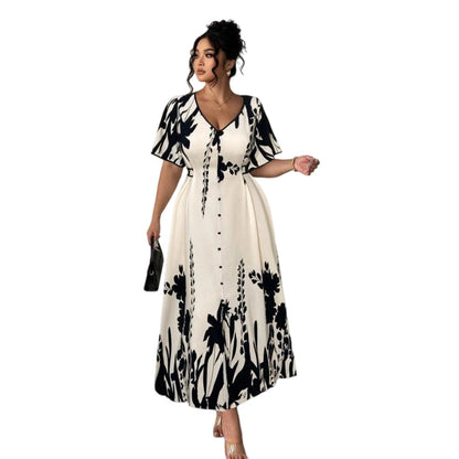 👗 50% RABATT NU! 🌿 Mjuk klänning i botaniskt mönster med V-ringning och medellång kjol – Elegant, lätt och mångsidig för alla tillfällen 🌸