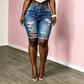 Kvinnors midjehöga bermudashorts i rivna jeans