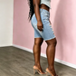 Kvinnors midjehöga bermudashorts i rivna jeans